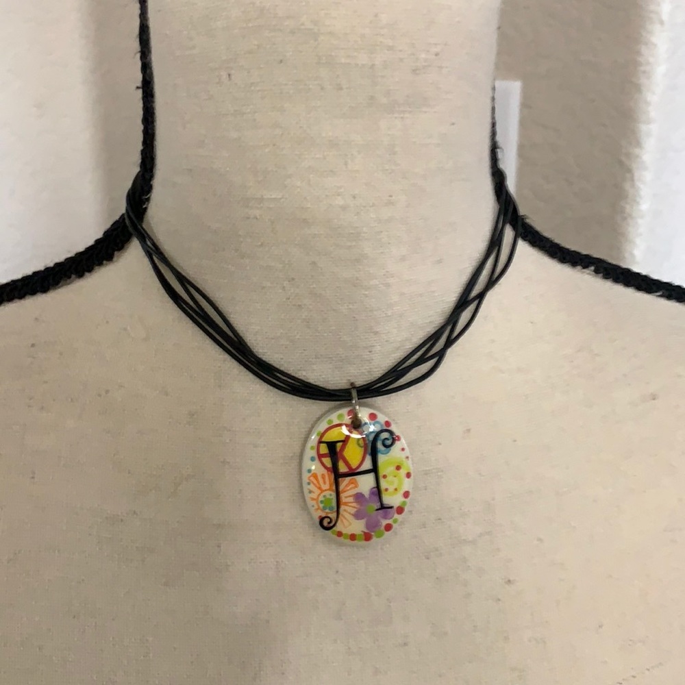 Black leather string cord choker necklace H floral oval resin medallion pendant